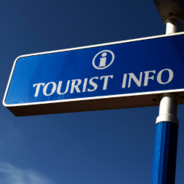 Tourist information sign with blue sky in the background