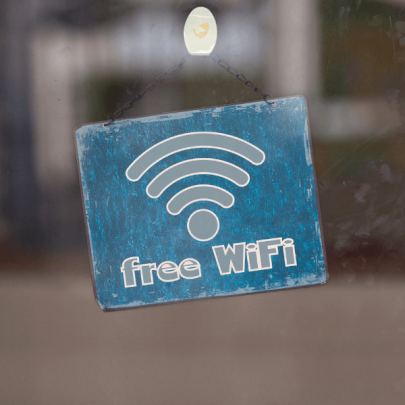 Sign on door that says free wifi